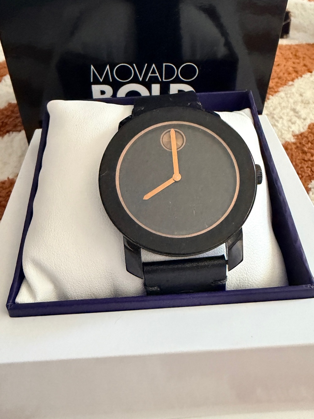 Movado Black Watch with Rose Gold Hands